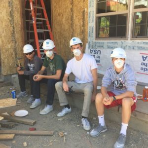 TSC members take a break building a house in Novato with Habitat for Humanity 